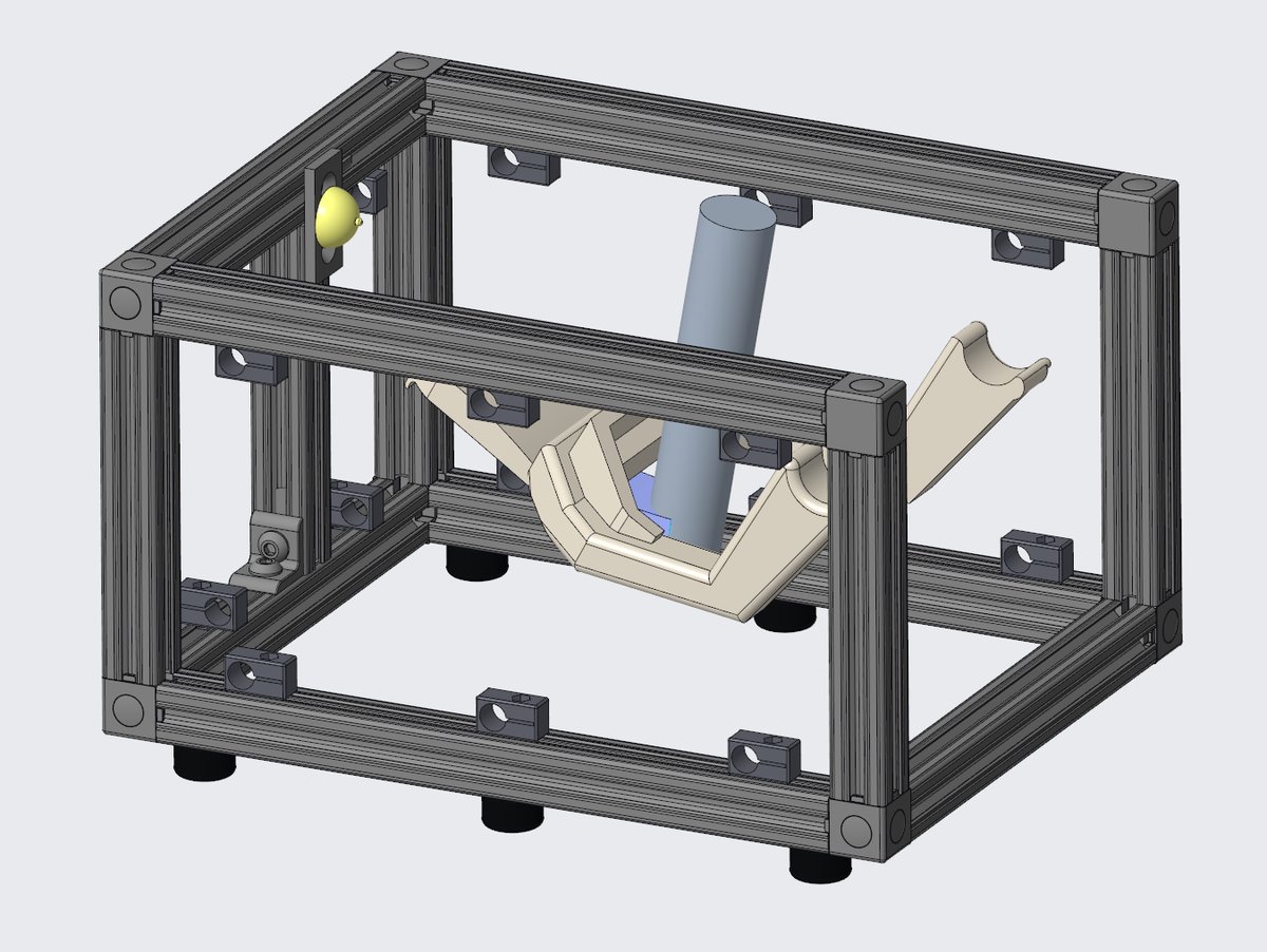 CAD model of the Bairway Trainer prototype, a T-slotted frame supporting a mechanically responsive jaw assembly