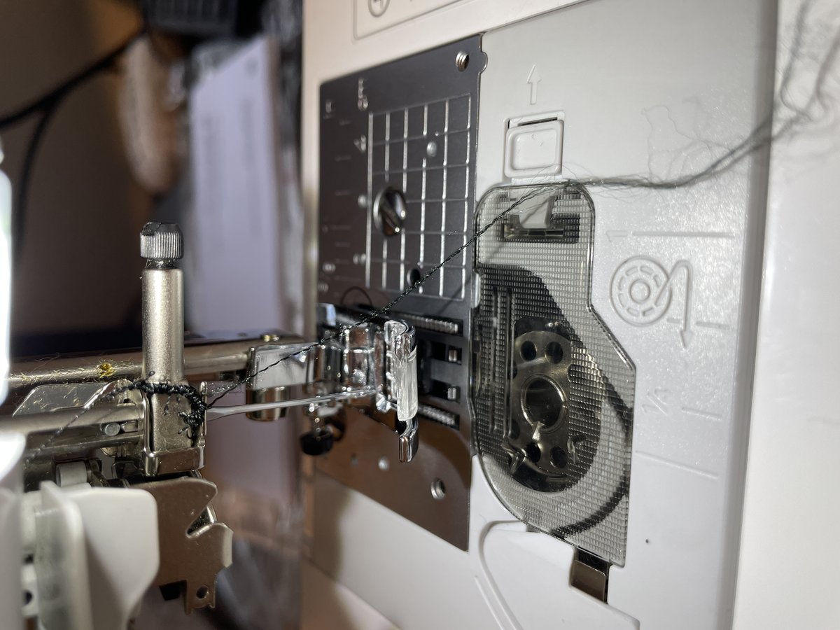 Close-up of a sewing machine mid-stitch on the StrideAssist prototype fabric.