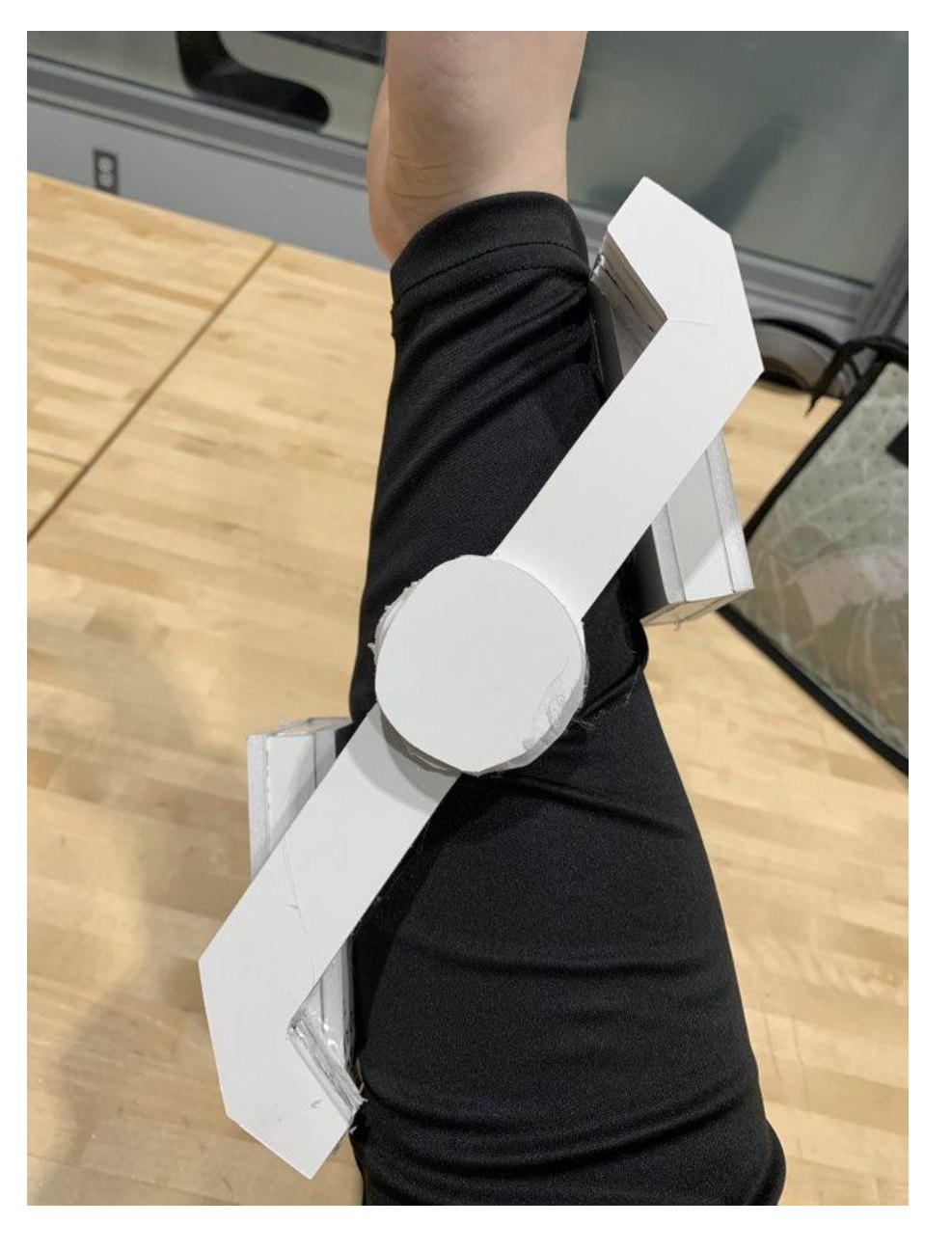The tremor damper prototype worn on a forearm